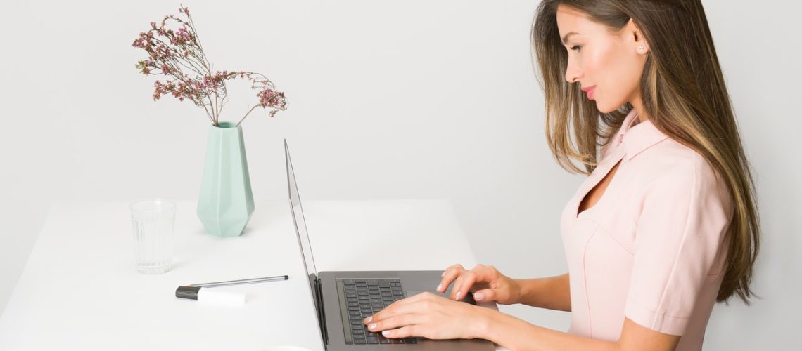 woman-in-pink-dress-using-laptop-computer-1586973 woman-in-pink-dress-using-laptop-computer-1586973